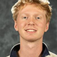 man sitting for professional headshot